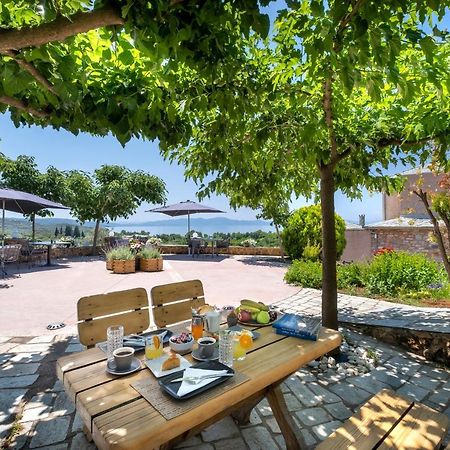Iakovakis Suites & Spa Koropi Bagian luar foto