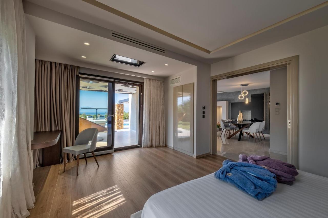 Iakovakis Suites & Spa Koropi Bagian luar foto
