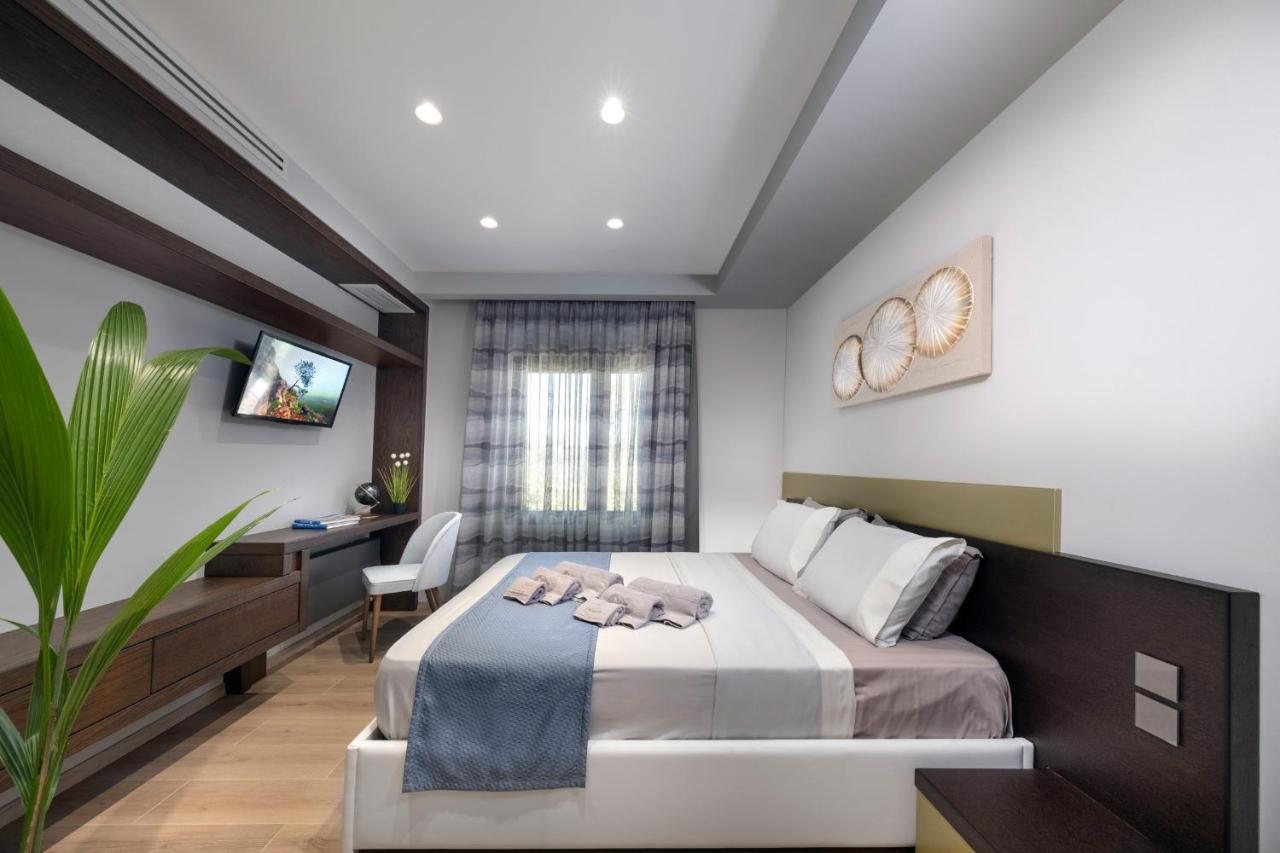 Iakovakis Suites & Spa Koropi Bagian luar foto