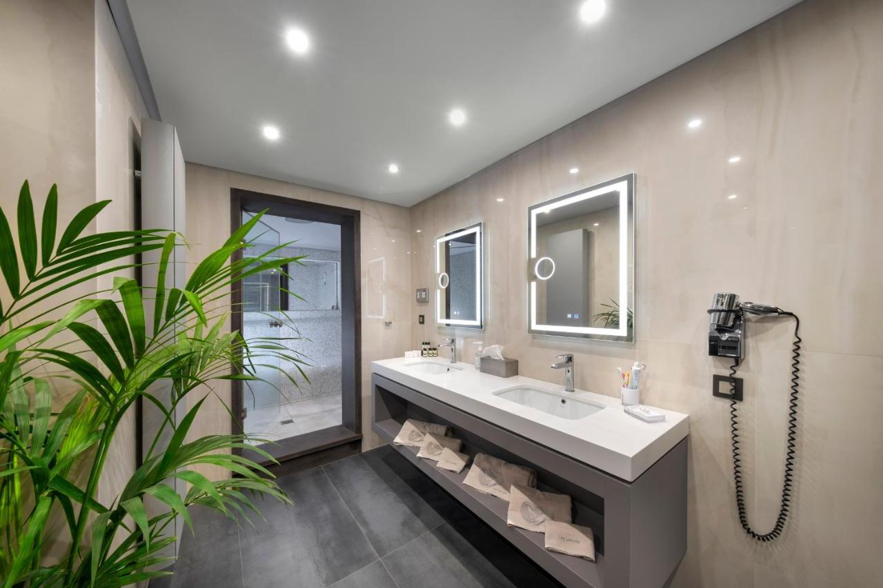 Iakovakis Suites & Spa Koropi Bagian luar foto